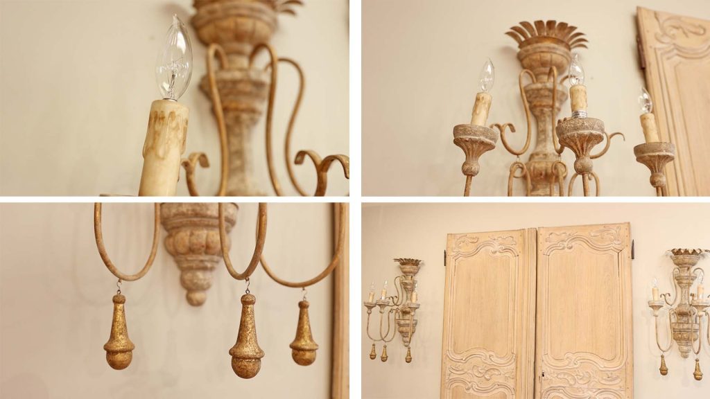 Closeup features of gold chippy wall sconces at Village Antiques.