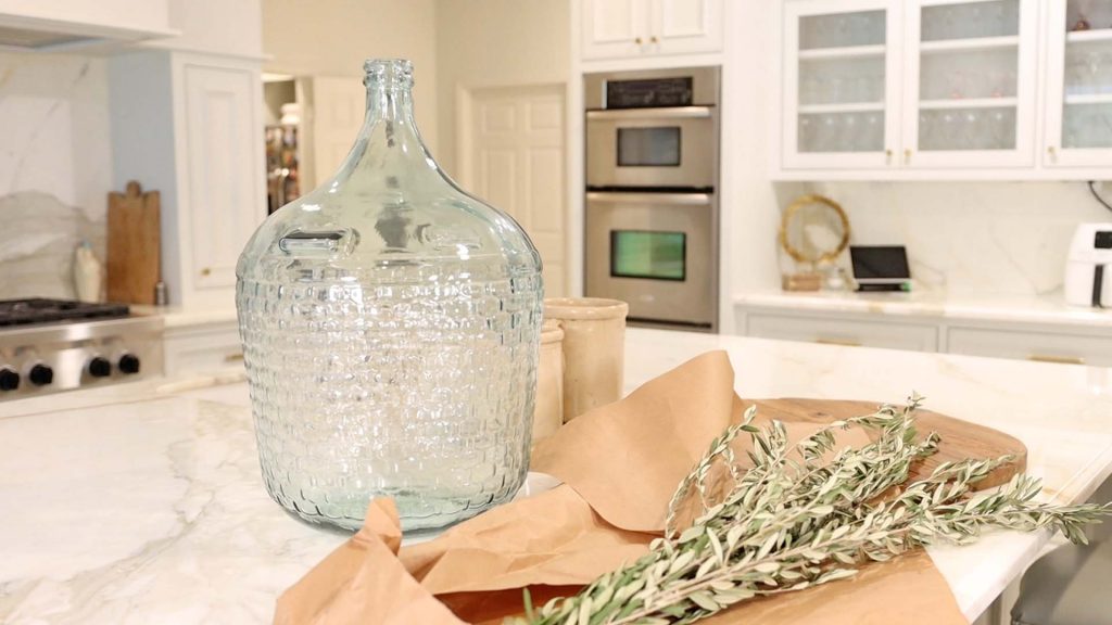 Amitha Verma uses oversized glass jars available at Village Antiques to decorate her home for early fall.